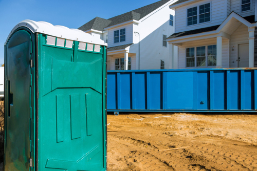 porta potty on a home job site